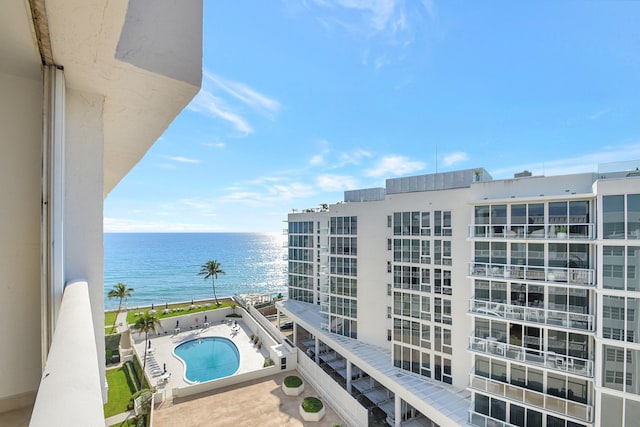 balcony featuring a water view