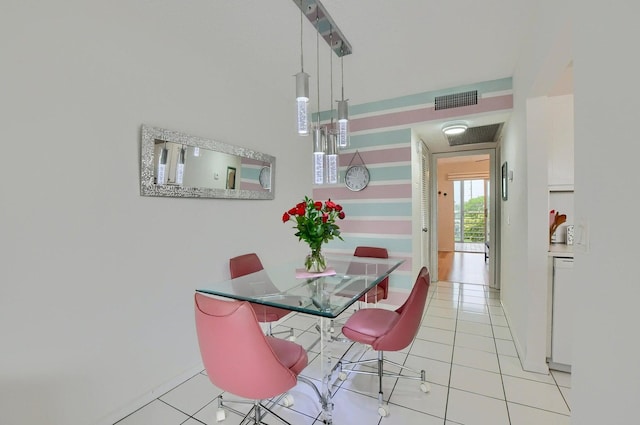 dining room featuring light tile patterned floors