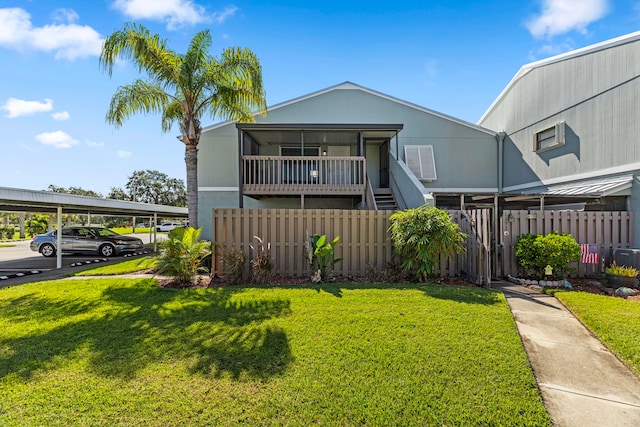 view of front of home with a front lawn