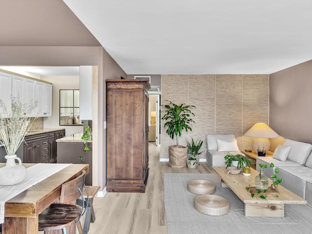 living room with light hardwood / wood-style floors