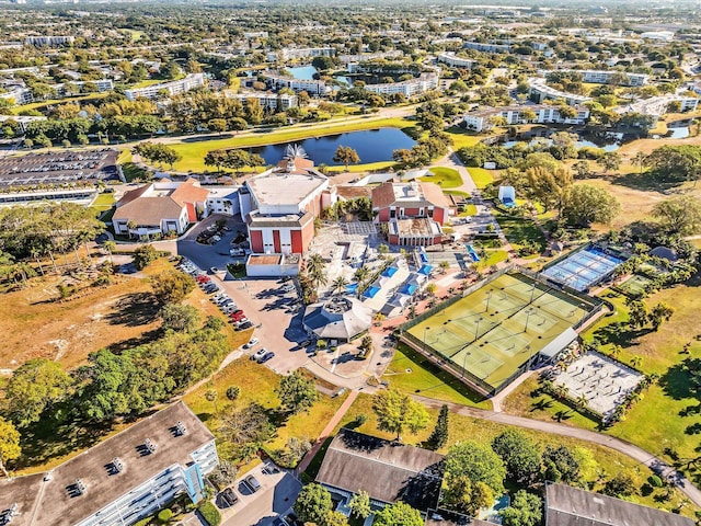 aerial view featuring a water view and a residential view