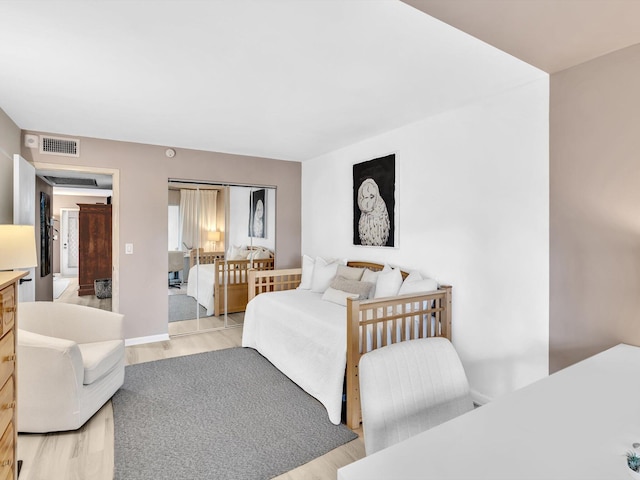 bedroom featuring light wood-type flooring