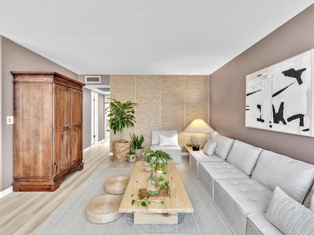 living room with light hardwood / wood-style floors