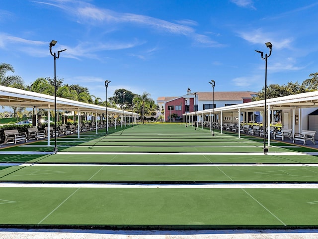 surrounding community featuring shuffleboard and a residential view