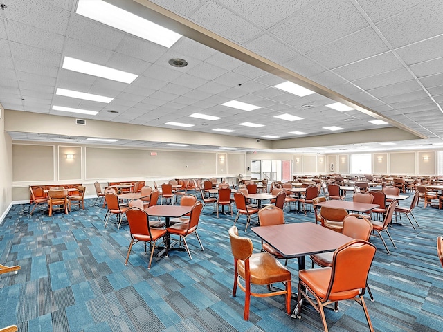 view of carpeted dining space