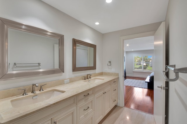 bathroom featuring vanity and wood-type flooring