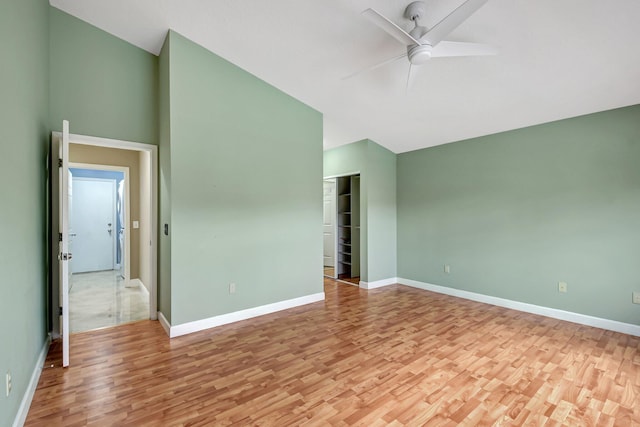 spare room featuring light wood-type flooring and ceiling fan