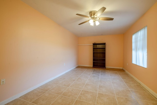 3537 SW Sunset Trace Cir, Palm City, FL 34990 - unfurnished room featuring a ceiling fan, light tile patterned floors, and baseboards