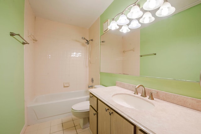 full bathroom featuring tile patterned flooring, vanity, toilet, and tiled shower / bath