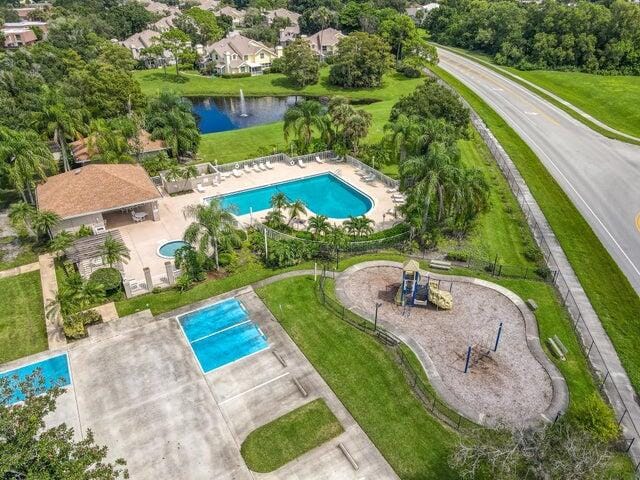 view of swimming pool with a water view