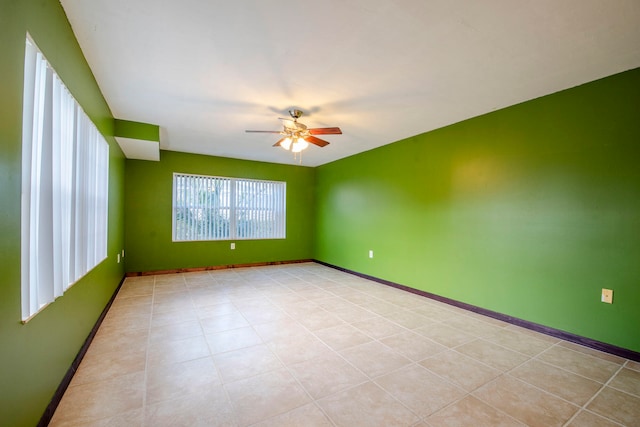 spare room featuring ceiling fan