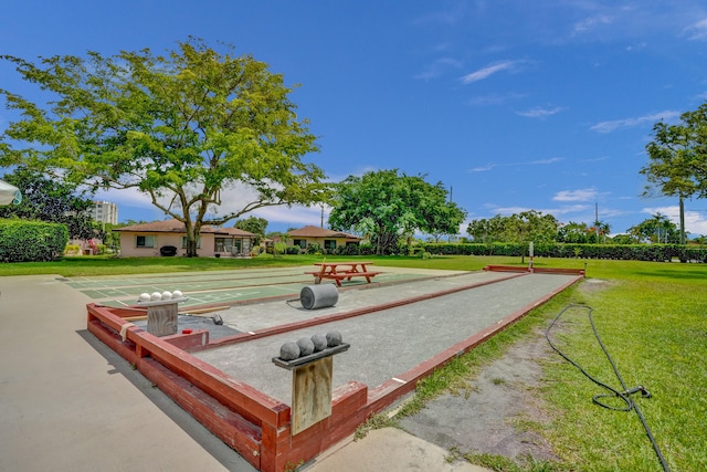 view of home's community with a lawn