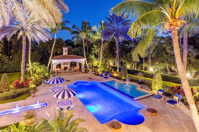 view of pool with a gazebo and a patio area