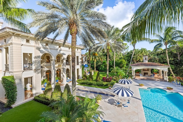 view of pool featuring a gazebo and a patio