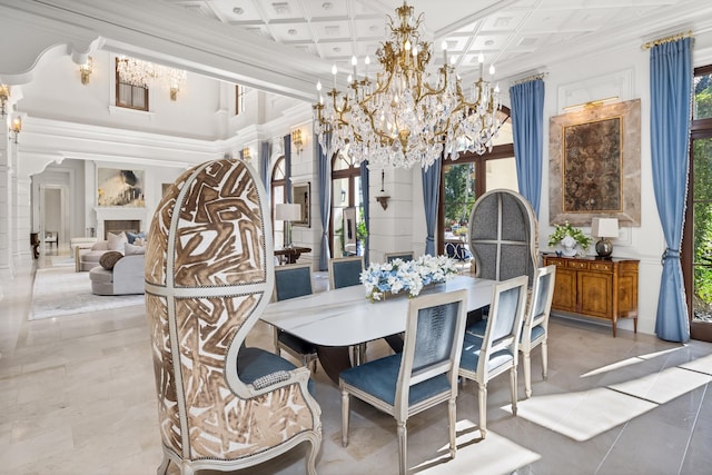 dining area featuring crown molding, plenty of natural light, and coffered ceiling