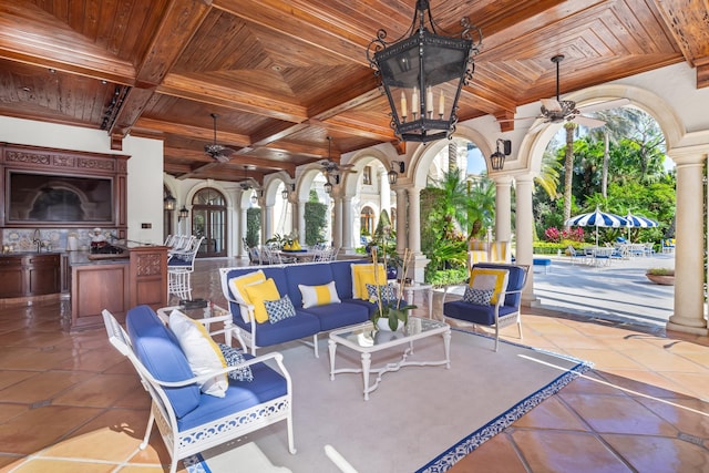 view of patio / terrace with outdoor lounge area, ceiling fan, french doors, and area for grilling