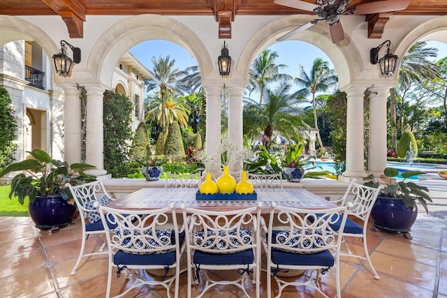 view of patio featuring ceiling fan