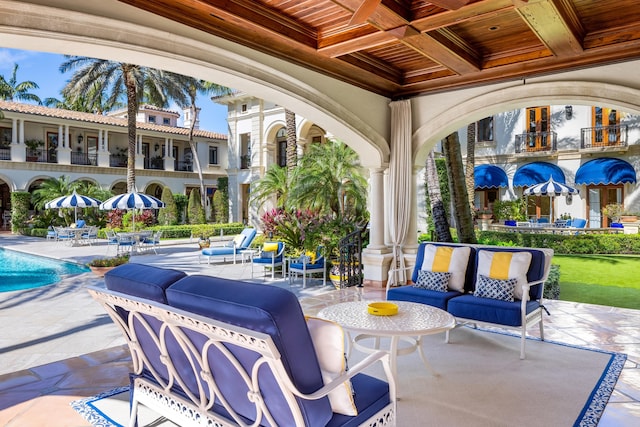 view of patio / terrace with an outdoor hangout area and a community pool