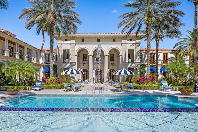 view of pool featuring a patio and pool water feature