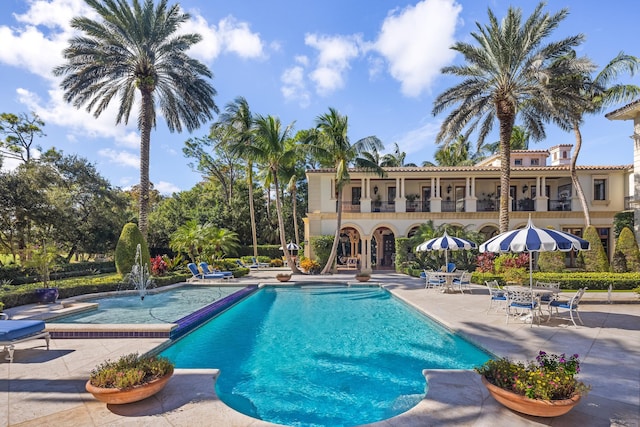 view of pool featuring a patio area