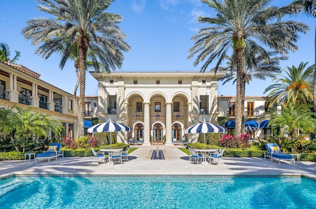 view of swimming pool featuring a patio