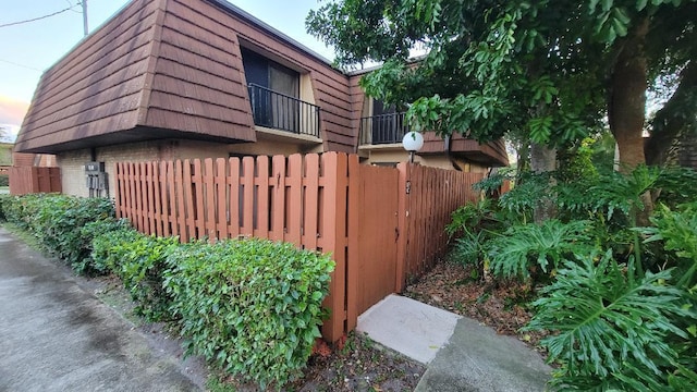 view of property exterior with a balcony