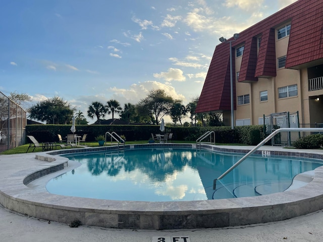 community pool with fence