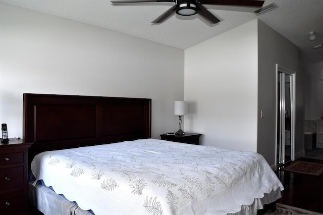 bedroom featuring ceiling fan and vaulted ceiling