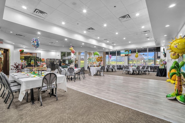 dining area with hardwood / wood-style flooring