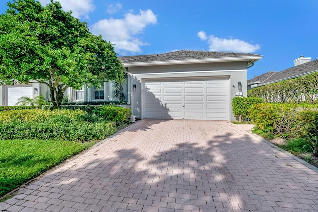 view of front of home featuring a garage