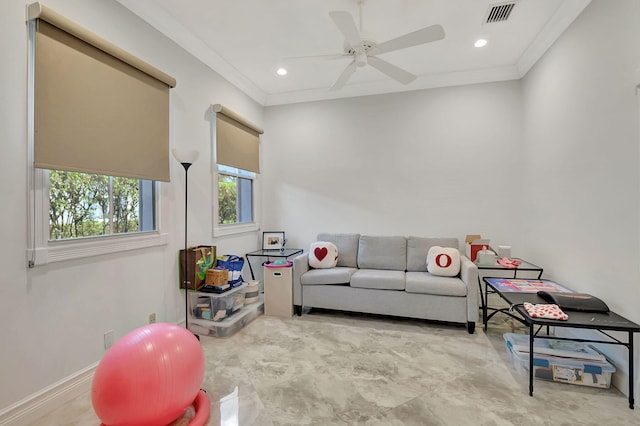 interior space with ceiling fan and crown molding