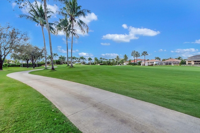 view of home's community featuring a lawn