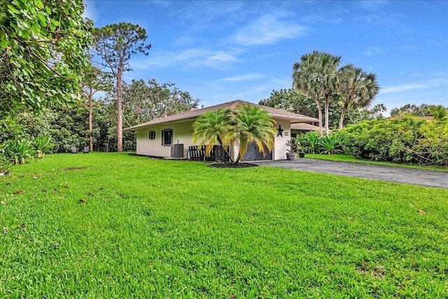 view of front of property with a front lawn