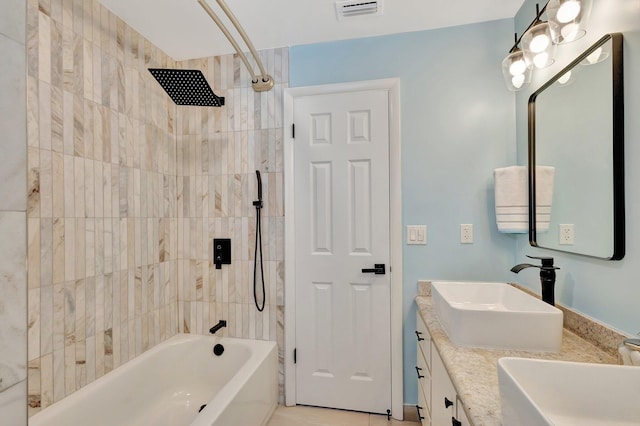 bathroom featuring a sink, visible vents, bathing tub / shower combination, and double vanity