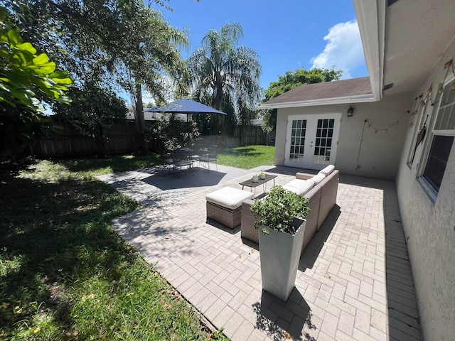 view of patio with outdoor lounge area and french doors