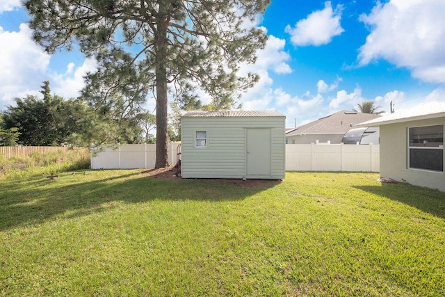 view of yard with a storage shed