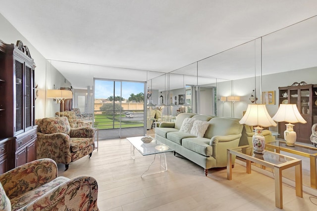 2300 NE 1st Ln Unit 307, Boynton Beach, FL 33435 - living room featuring wood finished floors