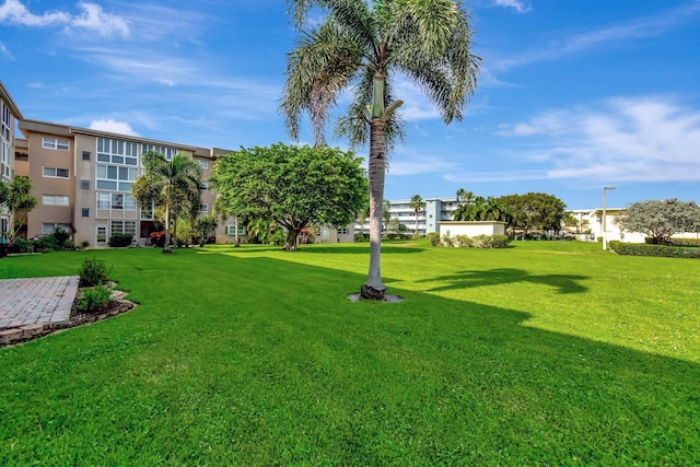 2300 NE 1st Ln Unit 307, Boynton Beach, FL 33435 - view of home's community featuring a lawn