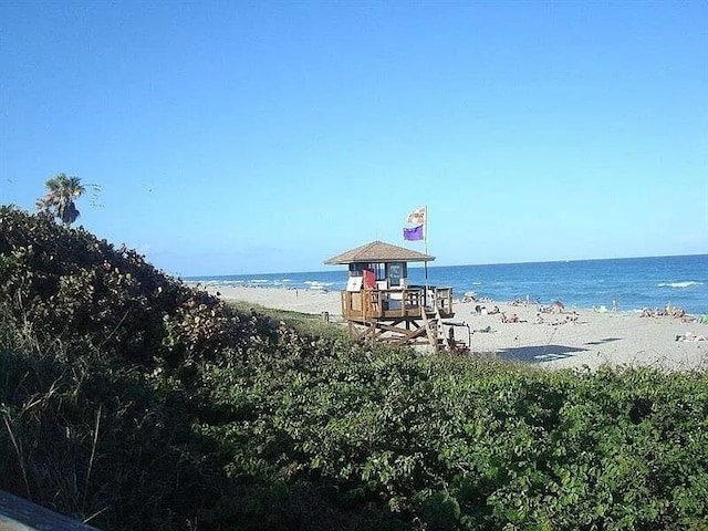 view of water feature featuring a beach view