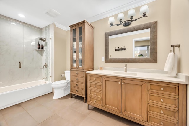 full bathroom with vanity, shower / bath combination with glass door, tile patterned floors, toilet, and ornamental molding