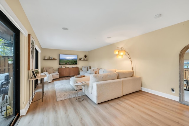 living room with light hardwood / wood-style floors