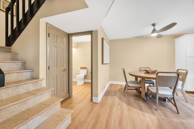 dining area featuring ceiling fan and light hardwood / wood-style flooring