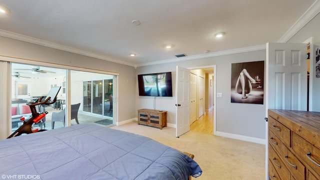 bedroom featuring crown molding, light carpet, and access to outside