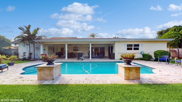 view of pool with a patio area and area for grilling