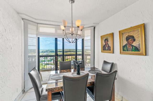 dining space with light tile patterned floors, a textured ceiling, and an inviting chandelier