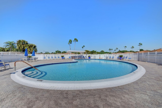 view of swimming pool featuring a patio