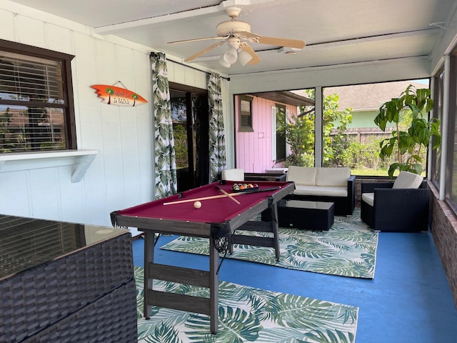 game room with ceiling fan and billiards