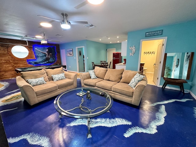 living room with ceiling fan