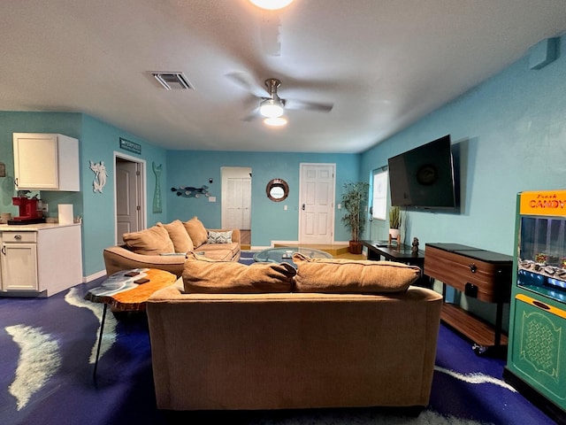 living room with ceiling fan