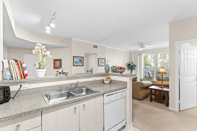 kitchen featuring light carpet, white cabinets, ceiling fan, sink, and dishwasher